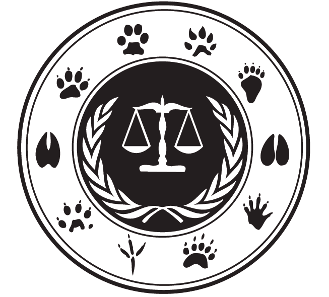 Scales of justice surrounded by animal footprints