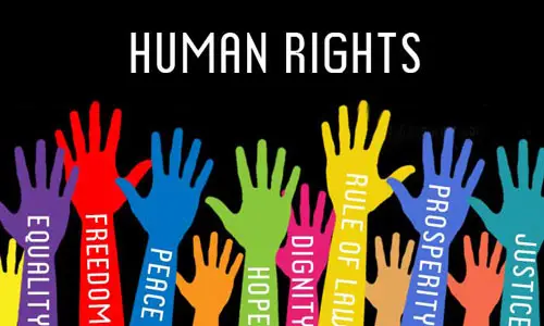 Colorful raised hands representing human rights